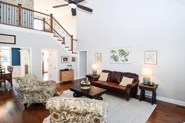 216 Honeysuckle Ln, Lebanon, TN 37087 - living area featuring wood finished floors, a towering ceiling, and ceiling fan