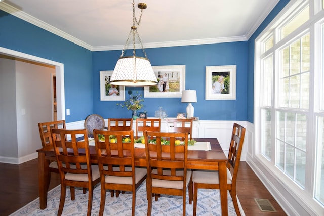 216 Honeysuckle Ln, Lebanon, TN 37087 - dining space with wood finished floors, healthy amount of natural light, crown molding, a wainscoted wall, and a chandelier