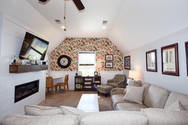 216 Honeysuckle Ln, Lebanon, TN 37087 - carpeted living room with wallpapered walls, lofted ceiling, a glass covered fireplace, and a ceiling fan
