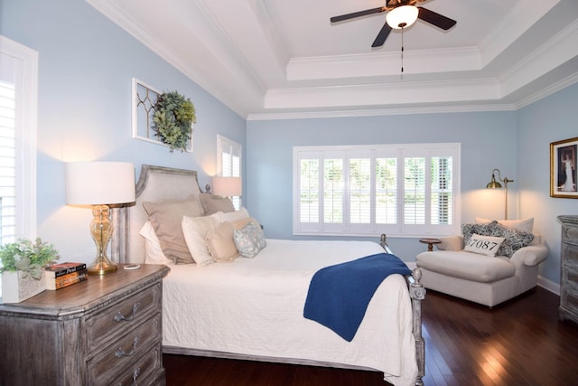 216 Honeysuckle Ln, Lebanon, TN 37087 - bedroom with a tray ceiling, dark wood-type flooring, ornamental molding, and a ceiling fan