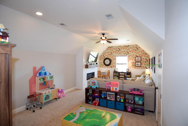 216 Honeysuckle Ln, Lebanon, TN 37087 - game room featuring a glass covered fireplace, carpet flooring, vaulted ceiling, and ceiling fan