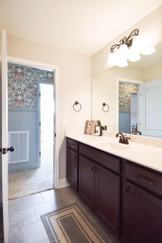 216 Honeysuckle Ln, Lebanon, TN 37087 - bathroom with vanity, a chandelier, wainscoting, and tile patterned floors