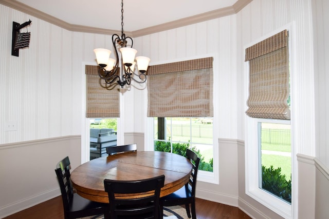 216 Honeysuckle Ln, Lebanon, TN 37087 - dining space featuring a chandelier, dark wood-style floors, wallpapered walls, and ornamental molding
