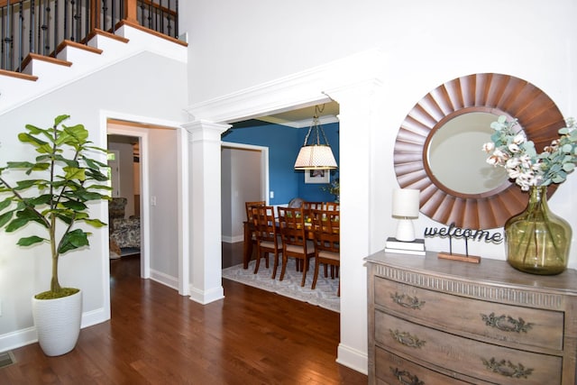216 Honeysuckle Ln, Lebanon, TN 37087 - corridor featuring wood finished floors, ornate columns, and stairs