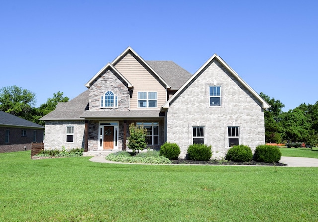 216 Honeysuckle Ln, Lebanon, TN 37087 - craftsman-style house with a front lawn and brick siding