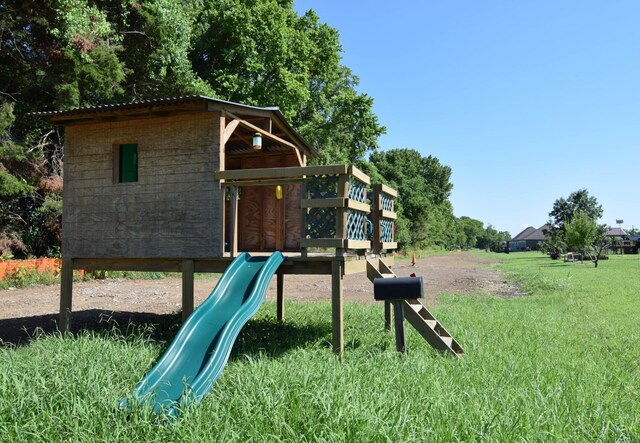 216 Honeysuckle Ln, Lebanon, TN 37087 - communal playground featuring a lawn