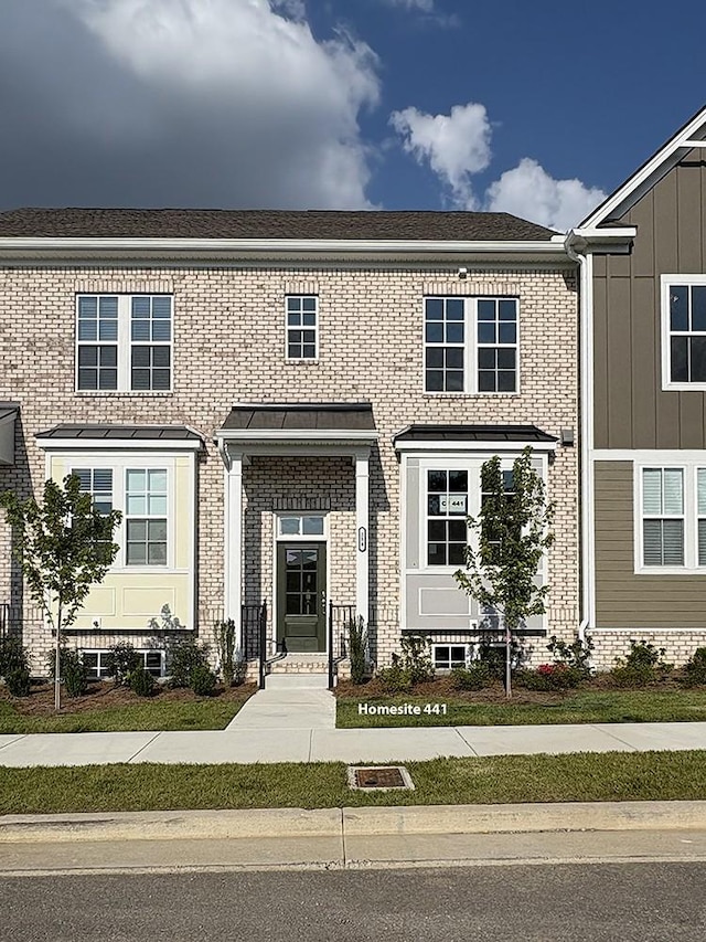 254 Savoy Loop, Nolensville, TN 37135 - view of property with brick siding and board and batten siding
