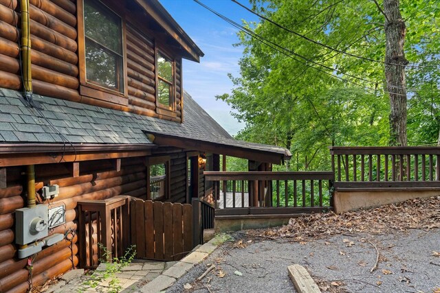 945 Scenic Trl, Gatlinburg, TN 37738 - view of property exterior featuring roof with shingles and faux log siding