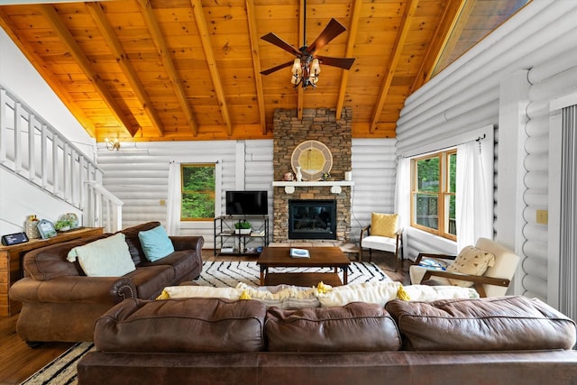 945 Scenic Trl, Gatlinburg, TN 37738 - living room with log walls, a wooden ceiling with exposed beams, wood-type flooring, a ceiling fan, and plenty of natural light