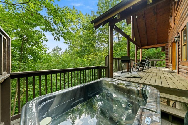945 Scenic Trl, Gatlinburg, TN 37738 - deck featuring a hot tub and grilling area