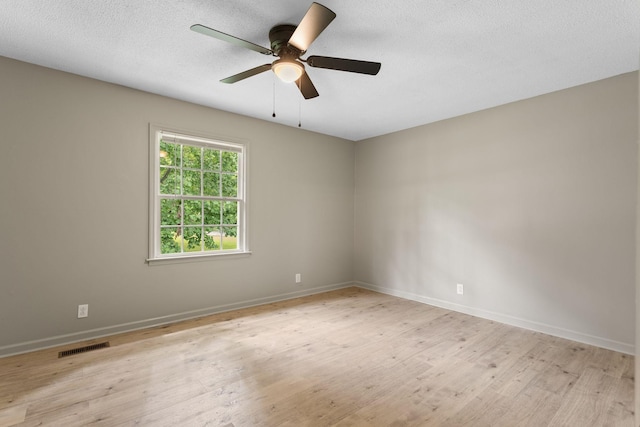 309 Shawnee Dr, Columbia, TN 38401 - unfurnished room featuring a ceiling fan, light wood-style floors, and a textured ceiling