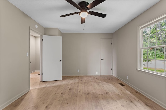 309 Shawnee Dr, Columbia, TN 38401 - unfurnished bedroom with light wood-type flooring and a ceiling fan