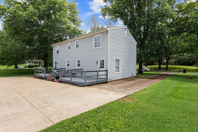 309 Shawnee Dr, Columbia, TN 38401 - rear view of property featuring a wooden deck and a yard