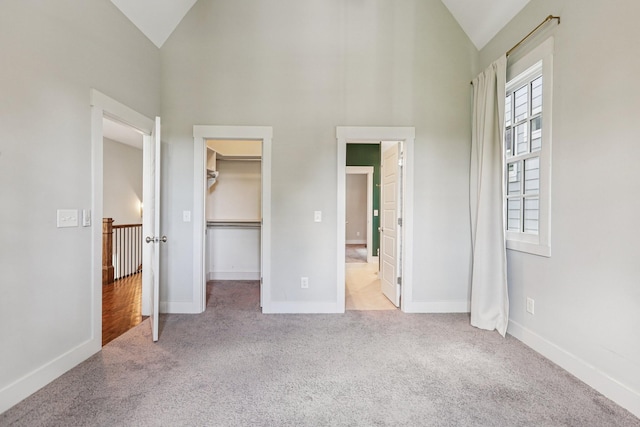 1605 Stokes Ln Unit A, Nashville, TN 37215 - unfurnished bedroom with carpet flooring, a spacious closet, high vaulted ceiling, and a closet