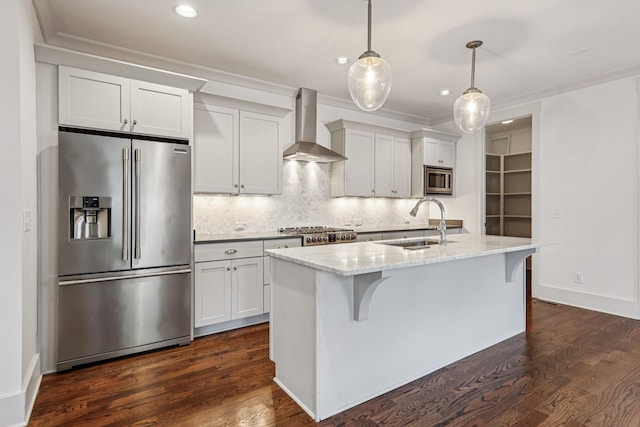 1605 Stokes Ln Unit A, Nashville, TN 37215 - kitchen with stainless steel appliances, wall chimney range hood, a center island with sink, backsplash, and dark wood finished floors