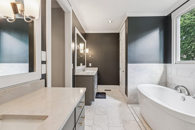 1605 Stokes Ln Unit A, Nashville, TN 37215 - full bathroom featuring a soaking tub, marble look tile flooring, vanity, recessed lighting, and ornamental molding