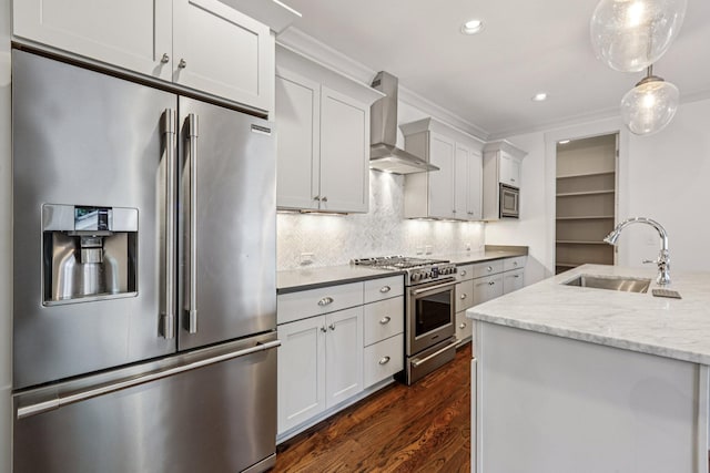 1605 Stokes Ln Unit A, Nashville, TN 37215 - kitchen with stainless steel appliances, wall chimney exhaust hood, dark wood-style flooring, tasteful backsplash, and recessed lighting