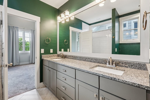 1605 Stokes Ln Unit A, Nashville, TN 37215 - bathroom with double vanity and tile patterned flooring