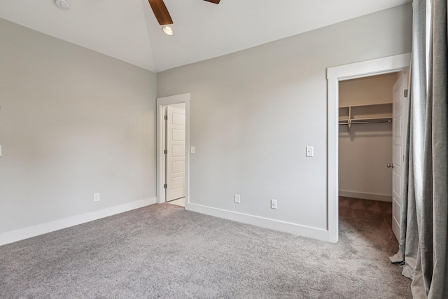 1605 Stokes Ln Unit A, Nashville, TN 37215 - unfurnished bedroom featuring carpet, a spacious closet, lofted ceiling, a ceiling fan, and a closet