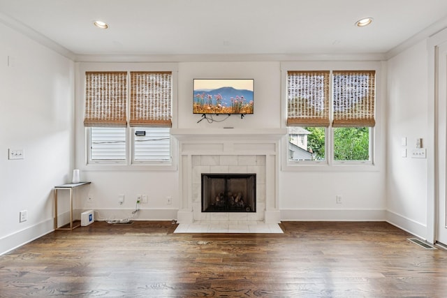 1605 Stokes Ln Unit A, Nashville, TN 37215 - unfurnished living room featuring wood finished floors, a tile fireplace, and recessed lighting