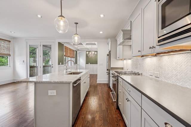 1605 Stokes Ln Unit A, Nashville, TN 37215 - kitchen featuring stainless steel appliances, decorative backsplash, dark wood finished floors, an island with sink, and recessed lighting