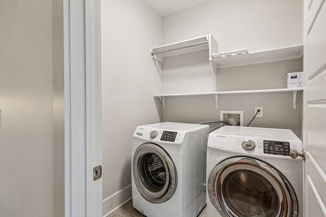 1605 Stokes Ln Unit A, Nashville, TN 37215 - washroom with washer and clothes dryer and baseboards