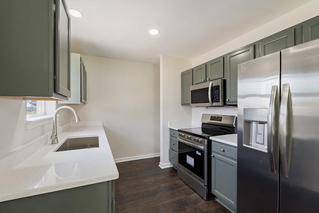 3136 Lauren Evelyn Way, Nashville, TN 37207 - kitchen featuring appliances with stainless steel finishes, recessed lighting, dark wood finished floors, and light stone countertops
