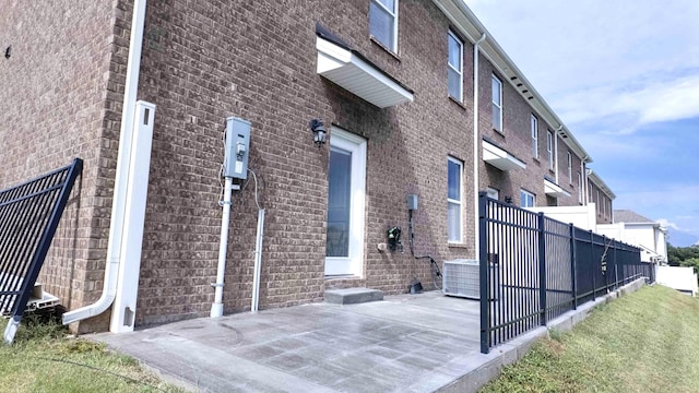 4289 Grapevine Loop, Smyrna, TN 37167 - view of side of property with brick siding and a patio area