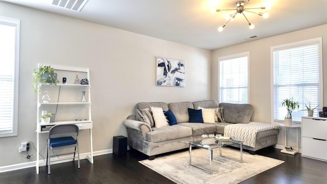 4289 Grapevine Loop, Smyrna, TN 37167 - living room with a chandelier and dark wood finished floors