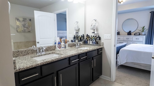 4289 Grapevine Loop, Smyrna, TN 37167 - ensuite bathroom with double vanity and tile patterned floors