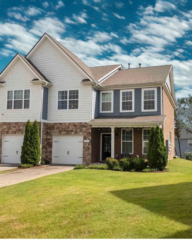 4289 Grapevine Loop, Smyrna, TN 37167 - view of front of house featuring an attached garage, driveway, and a front yard
