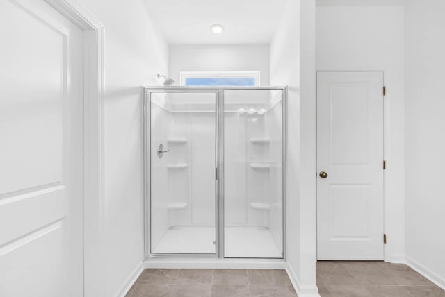 1234 English Oak Dr, Clarksville, TN 37043 - bathroom featuring a shower stall and tile patterned flooring