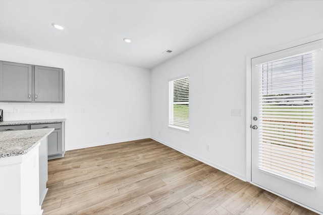 1234 English Oak Dr, Clarksville, TN 37043 - unfurnished dining area featuring light wood-type flooring and recessed lighting