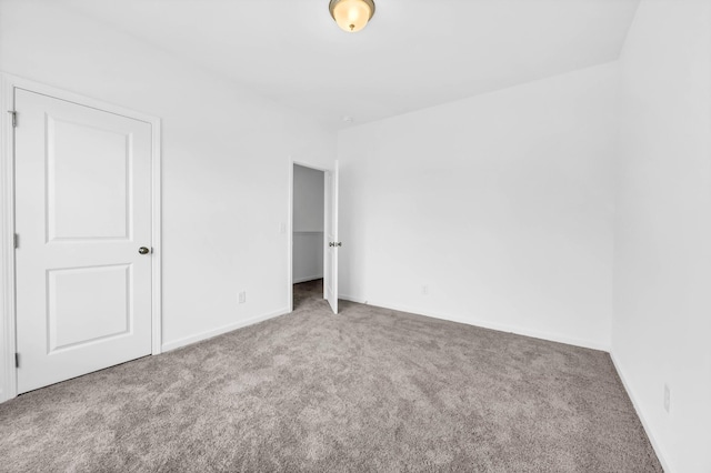 1234 English Oak Dr, Clarksville, TN 37043 - unfurnished bedroom with carpet and baseboards