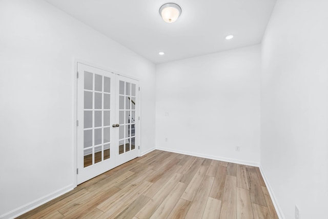 1234 English Oak Dr, Clarksville, TN 37043 - empty room with light wood finished floors, french doors, and recessed lighting