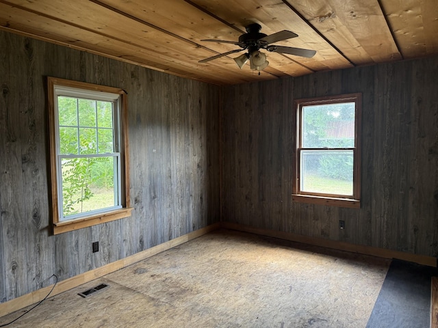 9843 Ed Lyell Rd, Lyles, TN 37098 - unfurnished room featuring healthy amount of natural light, wood ceiling, and a ceiling fan
