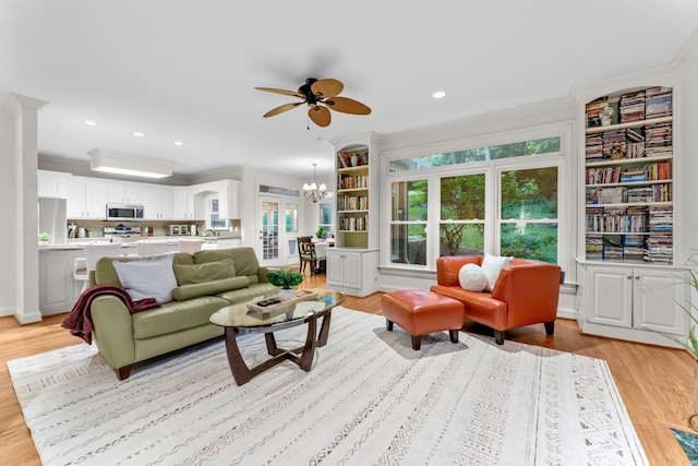 162 N Berwick Ln, Franklin, TN 37069 - living room featuring a ceiling fan, light wood finished floors, built in features, crown molding, and recessed lighting
