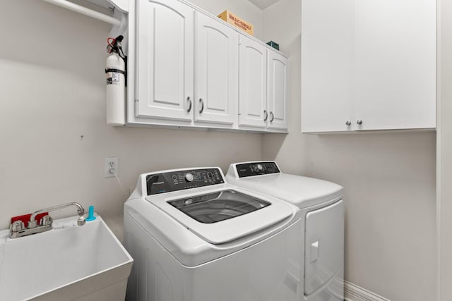 162 N Berwick Ln, Franklin, TN 37069 - washroom featuring washing machine and clothes dryer and cabinet space