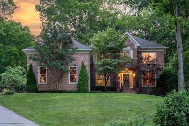 162 N Berwick Ln, Franklin, TN 37069 - view of front of house featuring a lawn and brick siding