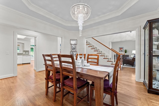 162 N Berwick Ln, Franklin, TN 37069 - dining area featuring stairs, a chandelier, light wood finished floors, and crown molding