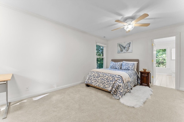 162 N Berwick Ln, Franklin, TN 37069 - carpeted bedroom featuring ornamental molding, a ceiling fan, and connected bathroom