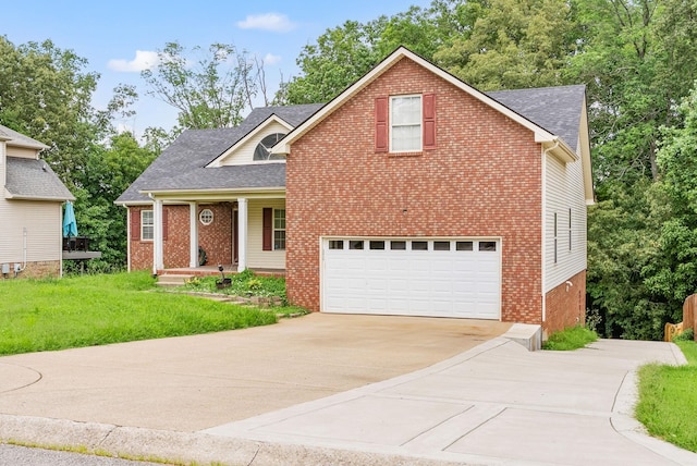 3158 Whitetail Dr, Clarksville, TN 37043 - traditional-style home featuring concrete driveway, brick siding, a garage, covered porch, and roof with shingles
