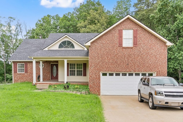 3158 Whitetail Dr, Clarksville, TN 37043 - traditional-style house with driveway, covered porch, a front yard, a garage, and brick siding