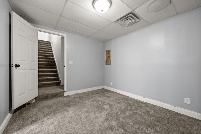 3158 Whitetail Dr, Clarksville, TN 37043 - basement featuring a drop ceiling, carpet, and stairs