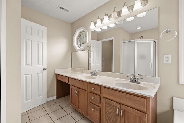 3158 Whitetail Dr, Clarksville, TN 37043 - full bathroom with double vanity, a stall shower, and tile patterned flooring