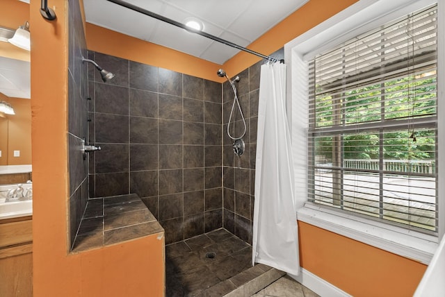 3158 Whitetail Dr, Clarksville, TN 37043 - full bath with tiled shower, vanity, and tile patterned flooring