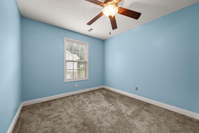 3158 Whitetail Dr, Clarksville, TN 37043 - empty room with carpet flooring, a textured ceiling, and a ceiling fan