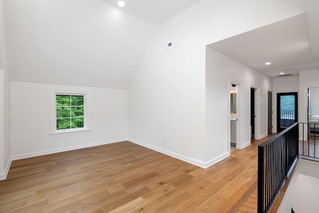 928 Harbor Pointe Dr, Silver Point, TN 38582 - empty room featuring light wood finished floors, attic access, recessed lighting, and lofted ceiling
