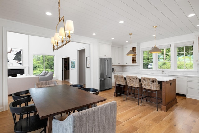 928 Harbor Pointe Dr, Silver Point, TN 38582 - dining area featuring recessed lighting, light wood-type flooring, wooden ceiling, and a chandelier