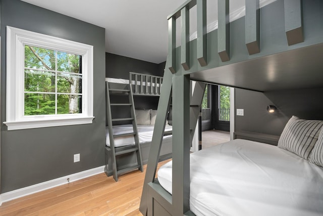 928 Harbor Pointe Dr, Silver Point, TN 38582 - bedroom with multiple windows and light wood-type flooring